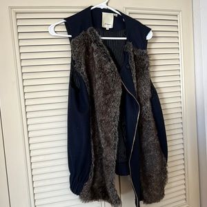 Navy blue wool and faux fur vest.